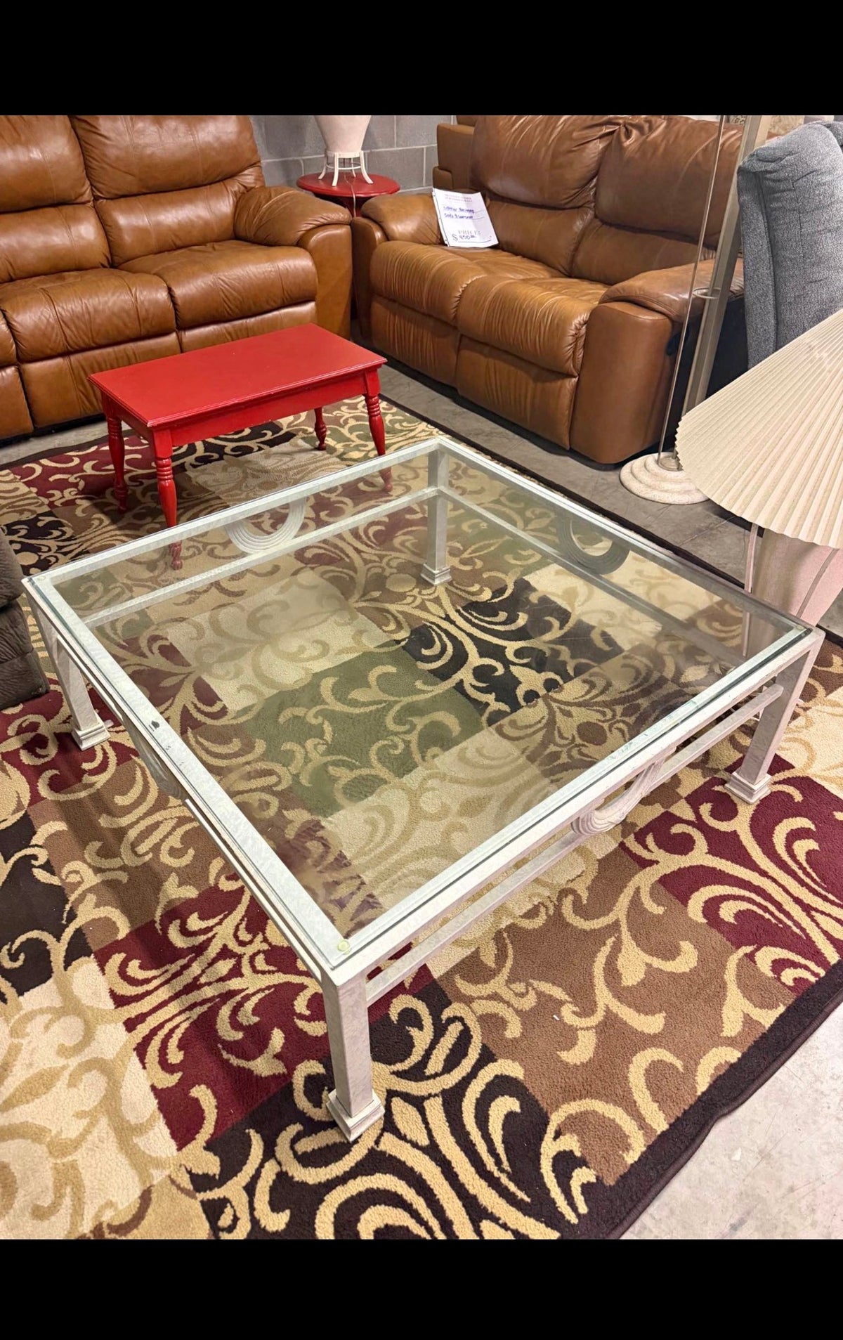 Glass-Top Metal Coffee Table — $125