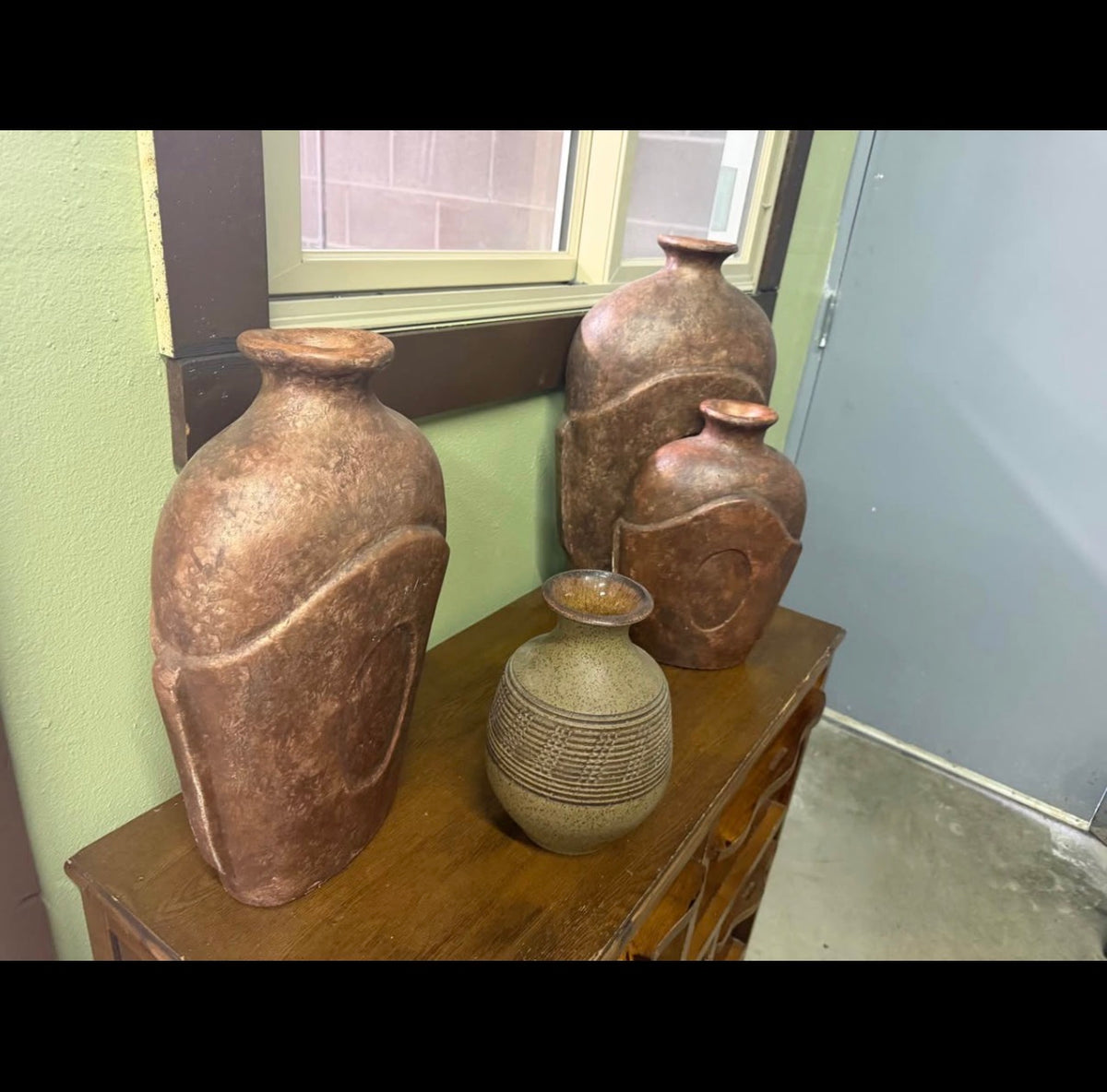 Set of 4 Decorative Vases — $100